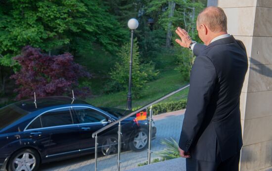 President Vladimir Putin holds talks with Federal Chancellor of Germany Angela Merkel