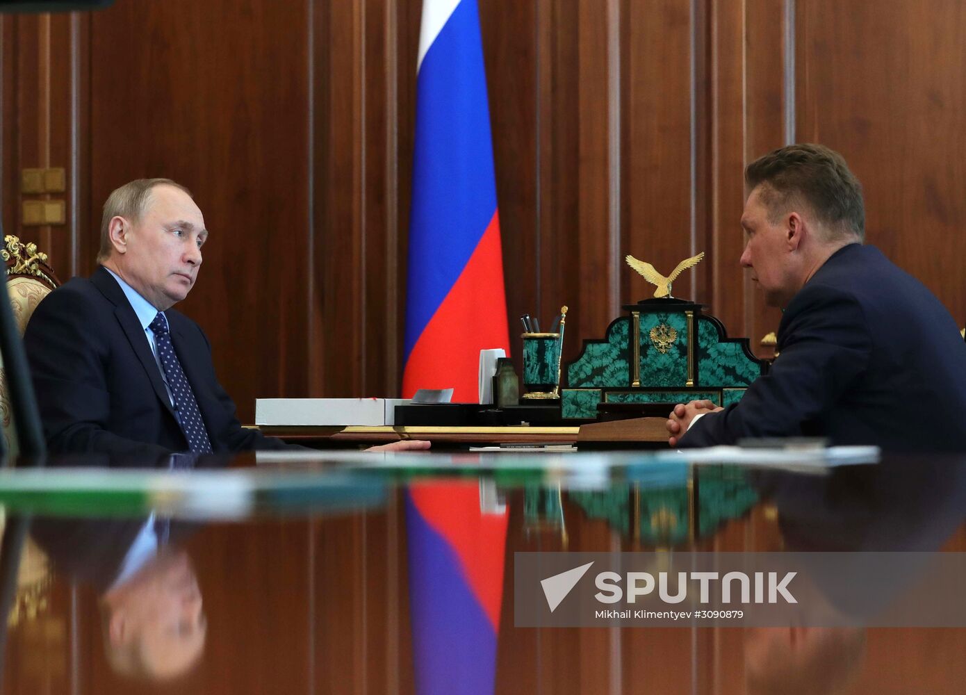 Russian President Vladimir Putin meets with Gazprom CEO Alexei Miller