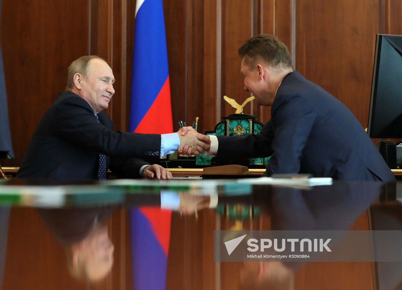 Russian President Vladimir Putin meets with Gazprom CEO Alexei Miller