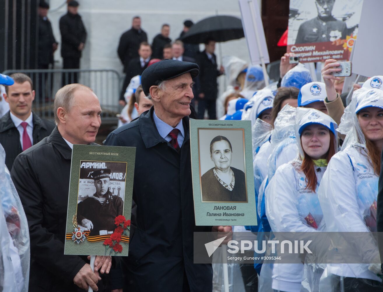 Russian President Vladimir Putin takes part in Immortal Regiment march