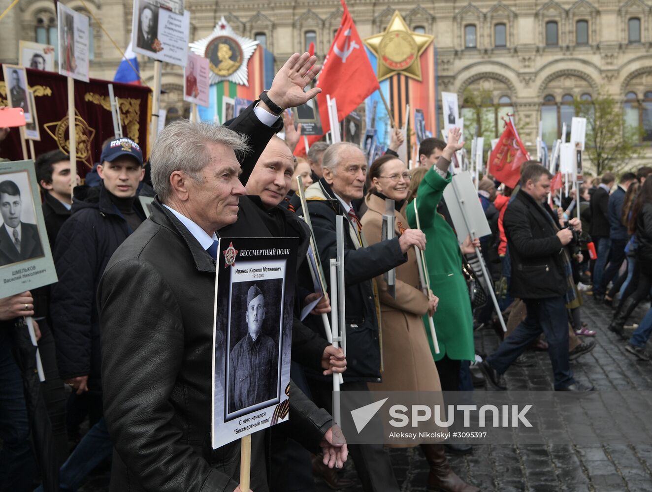 Russian President Vladimir Putin takes part in Immortal Regiment march