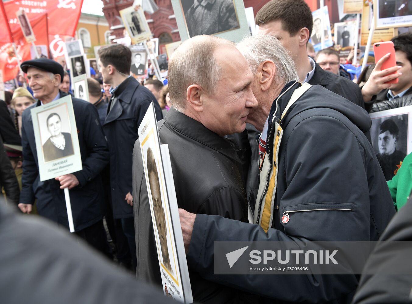 Russian President Vladimir Putin takes part in Immortal Regiment march