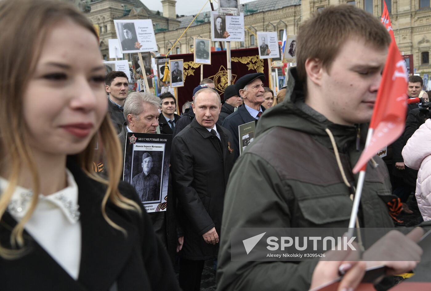 Russian President Vladimir Putin takes part in Immortal Regiment march