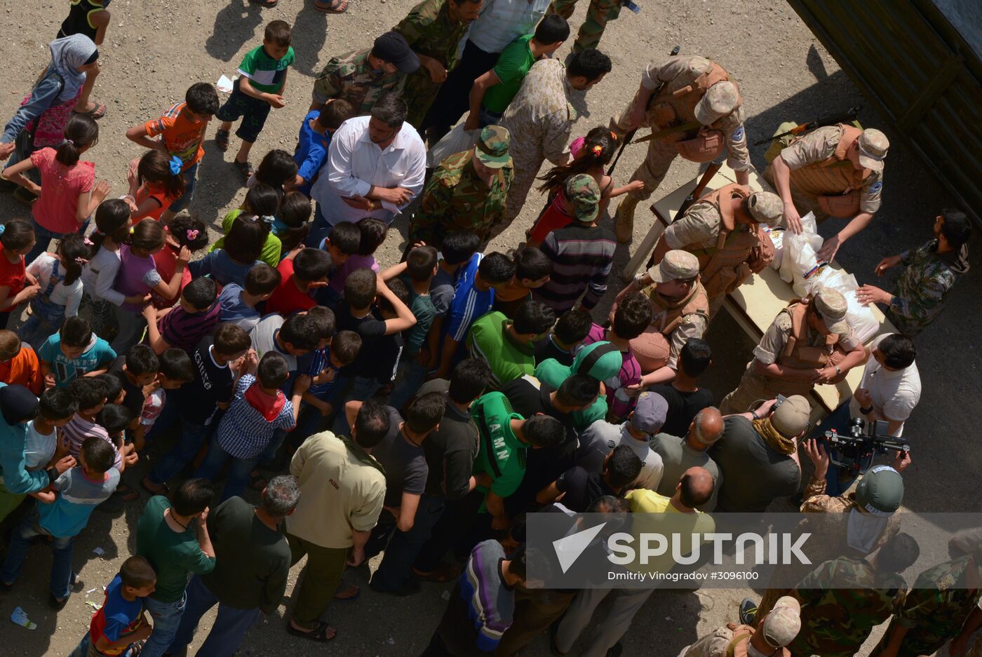 Russian humanitarian aid is distributed at Ras al-Bassit refugee camp