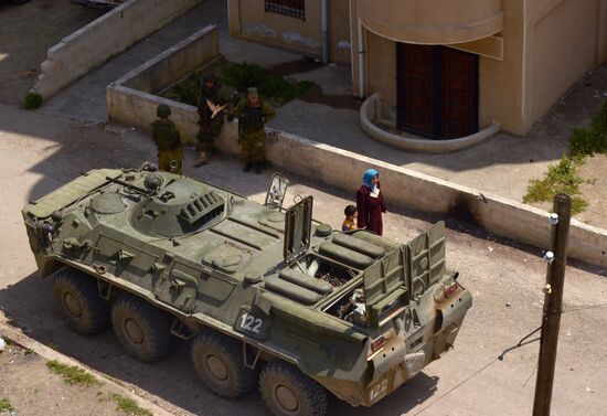 Russian humanitarian aid is distributed at Ras al-Bassit refugee camp
