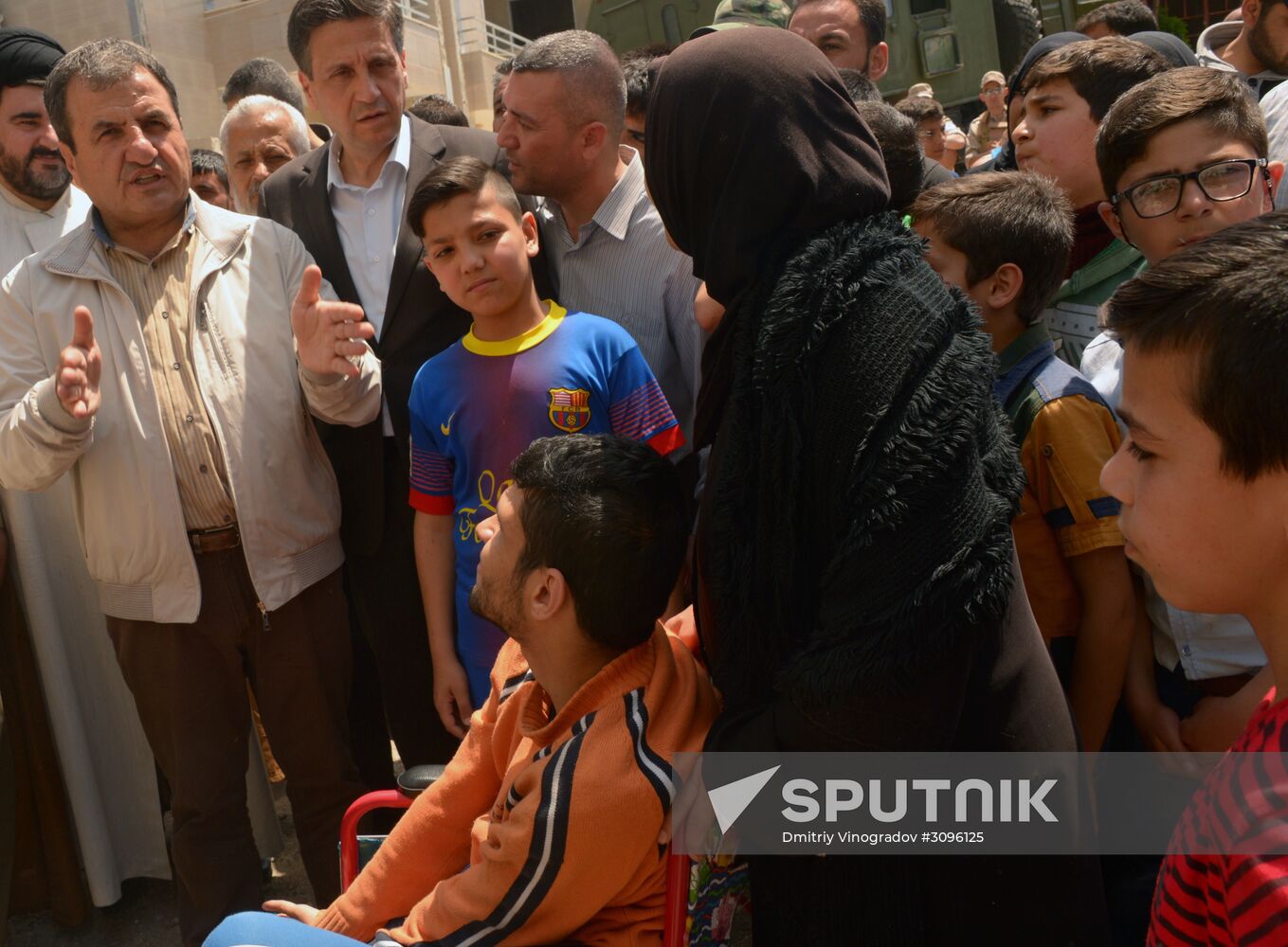 Russian humanitarian aid is distributed at Ras al-Bassit refugee camp