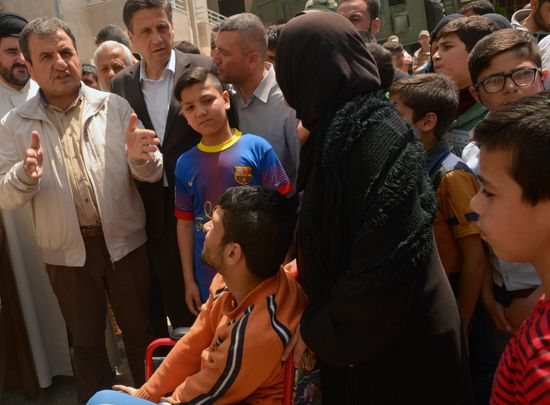 Russian humanitarian aid is distributed at Ras al-Bassit refugee camp