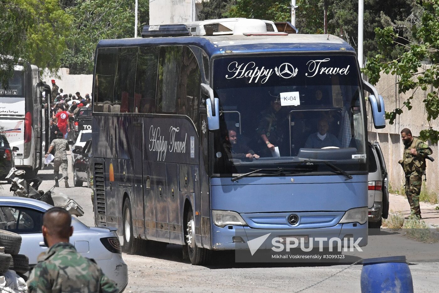 Militants and their families leave Damascus
