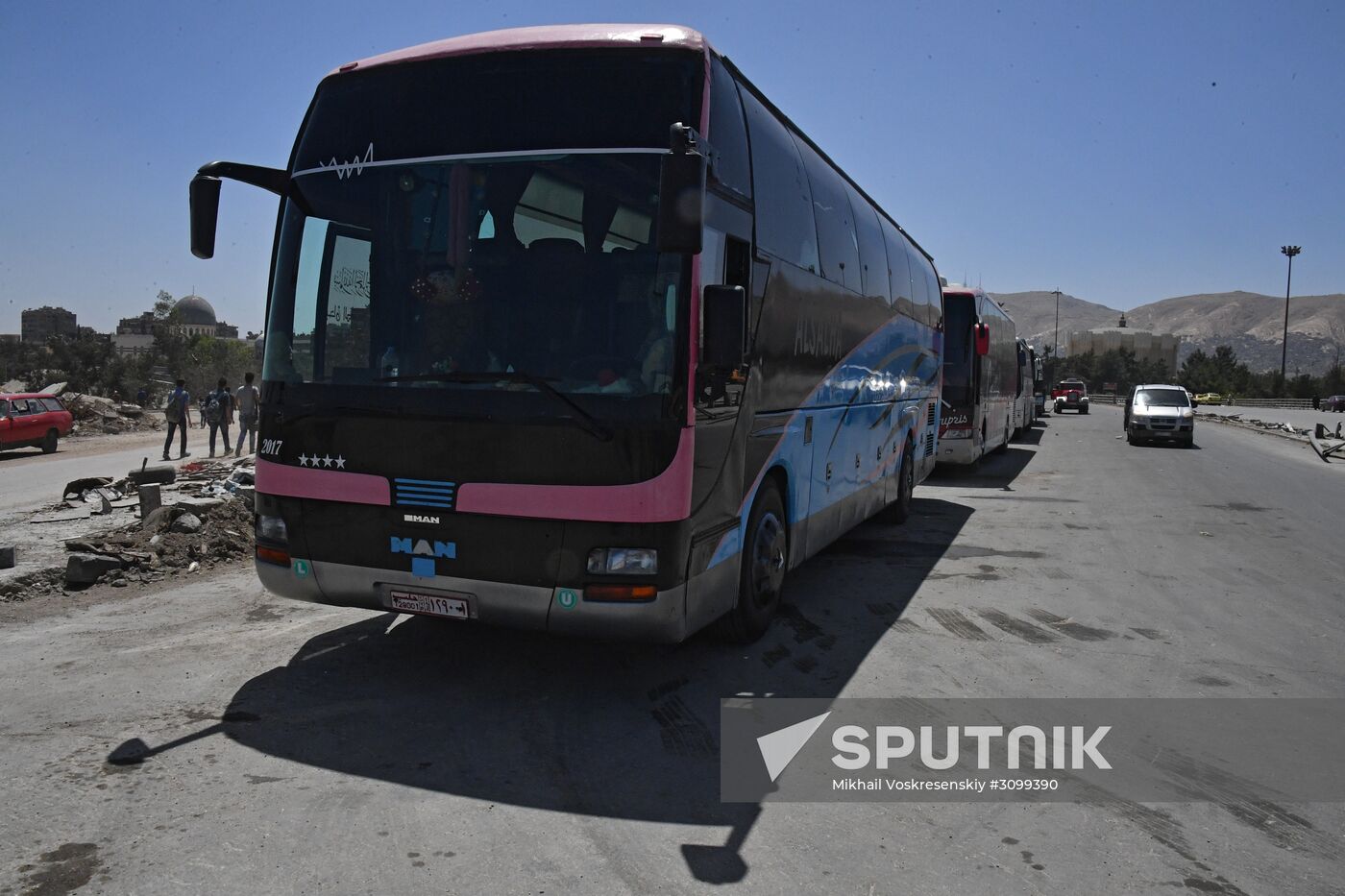 Militants and their families leave Damascus