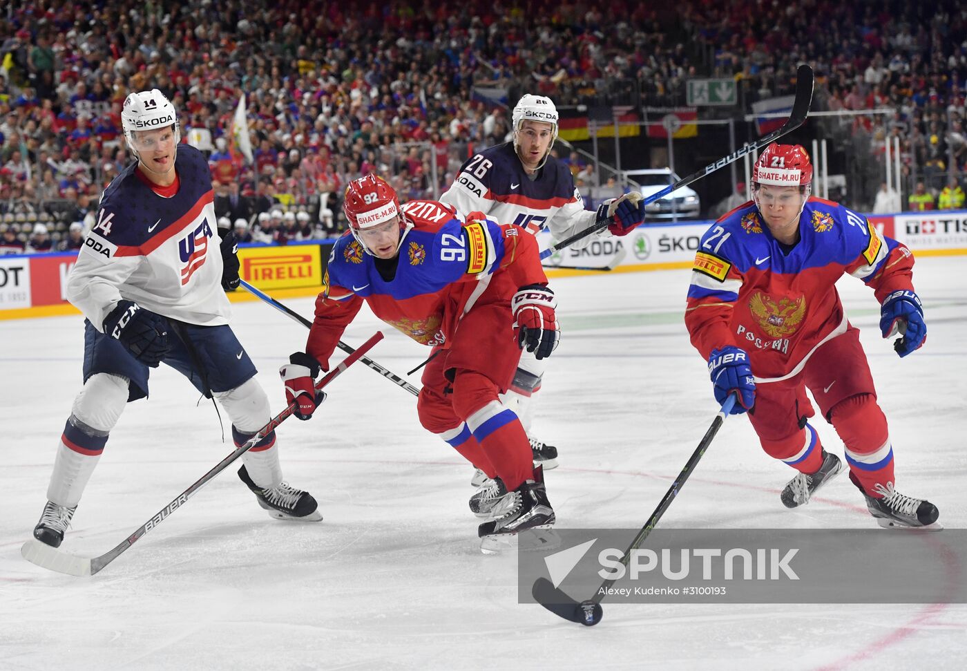 Fromleft: US player Nick Bjugstad, and Russia's players Yevgeny Kuznetsov and Alexander Barabanov at the 2017 IIHF World Championship group stage match between the national teams of Russia and the USA. Location: Germany, Cologne . Author: Alexey Kudenko/Sputnik. 2017 IIHF World Championship. Russia vs USA