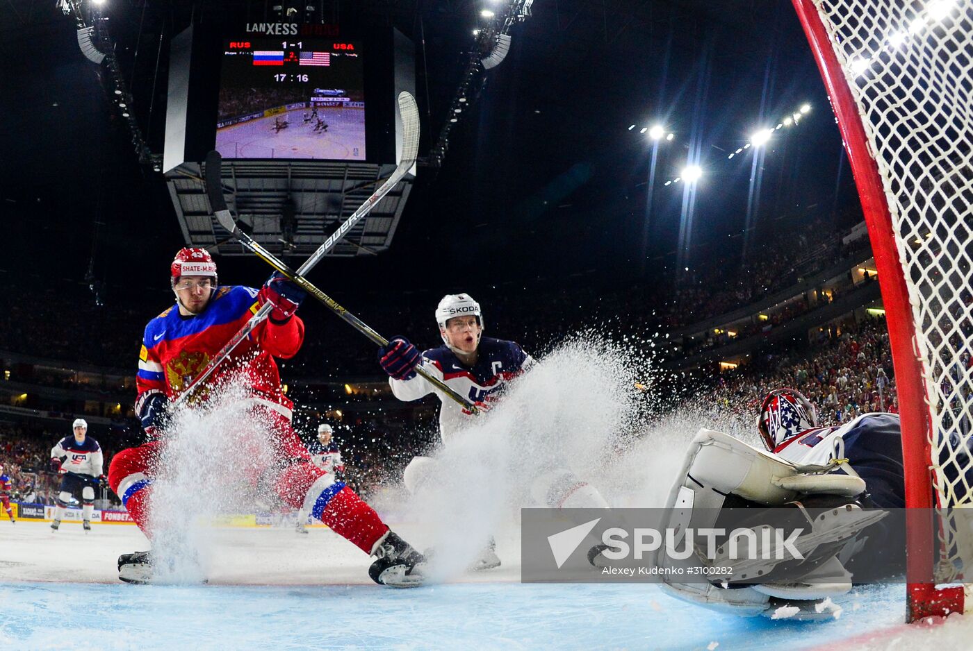 From left: Russia's player Valery Nichushkin, US player Connor Murphy and US goalie Jimmy Howard at the 2017 IIHF World Championship group stage match between the national teams of Russia and the USA. Location: Germany, Cologne . Author: Alexey Kudenko/Sputnik. 2017 IIHF World Championship. Russia vs US
