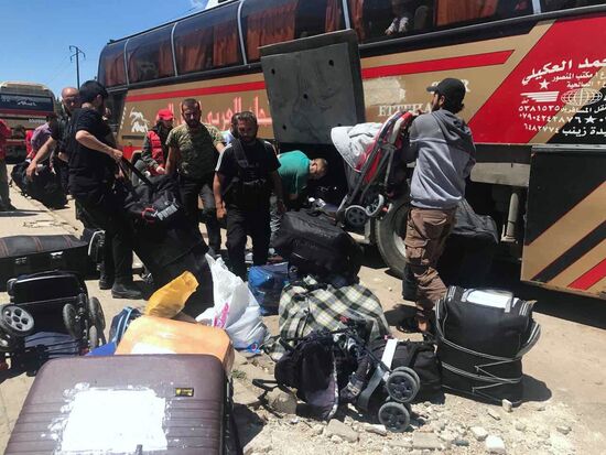 Last stage of militants' evacuation from Al Waer, Homs