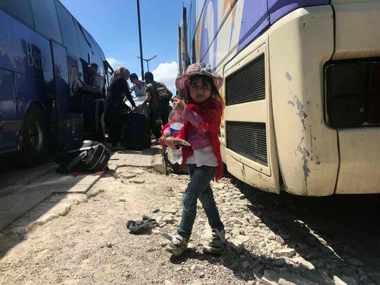 Last stage of militants' evacuation from Al Waer, Homs