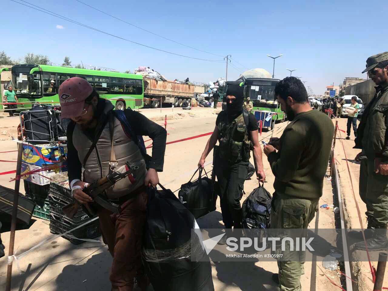 Last stage of militants' evacuation from Al Waer, Homs
