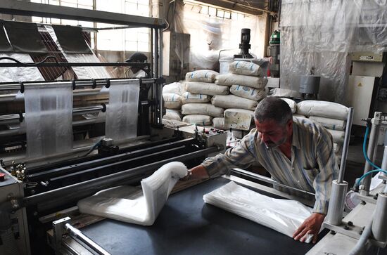 A polymer goods plant in eastern Damascus' Bab al-Sharqi district