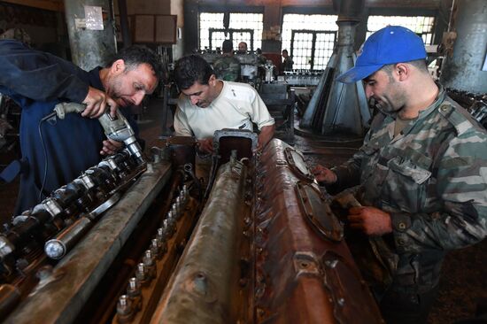 A plant for repairing and rebuilding armored vehicles in Damascus