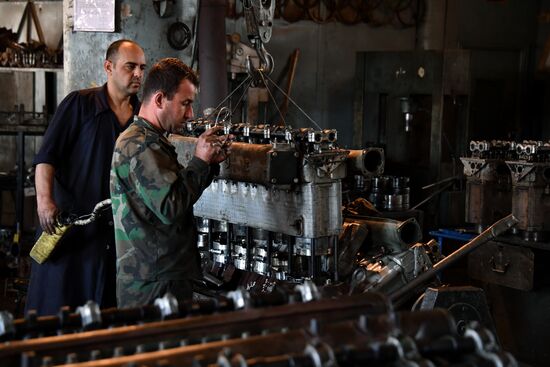 A plant for repairing and rebuilding armored vehicles in Damascus