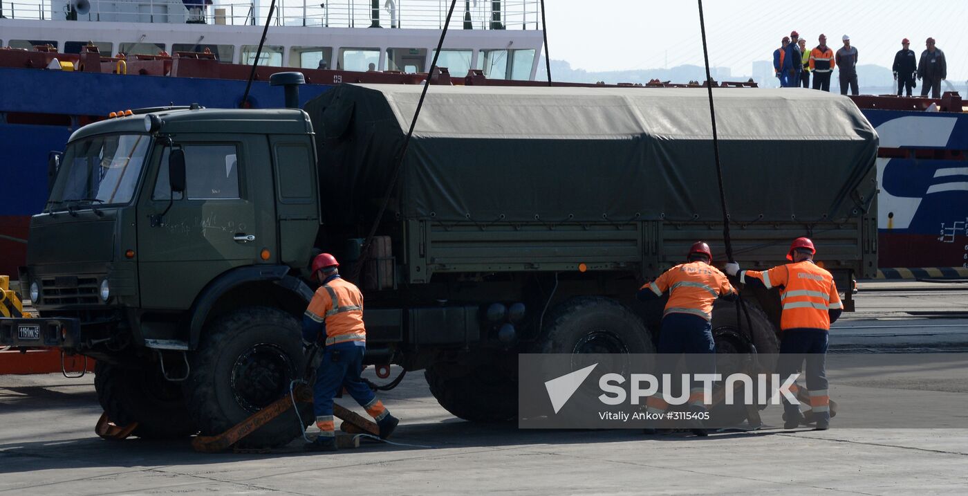 Loading military equipment aboard the vessel Captain Krems during an exercise in Vladivostok