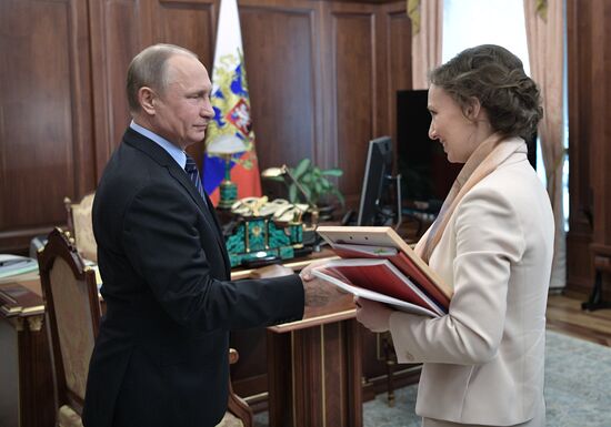 President Vladimir Putin meets with Children's Rights Commissioner Anna Kuznetsova
