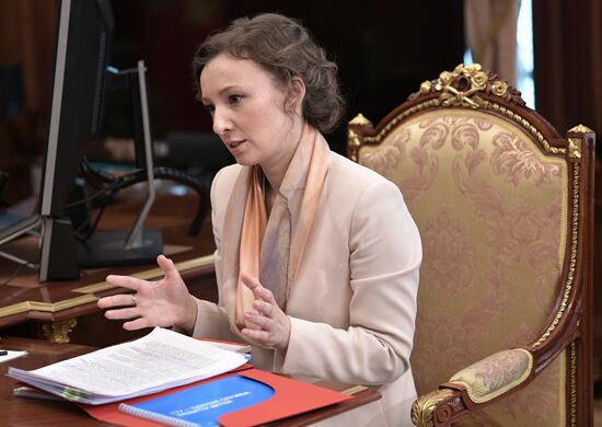 President Vladimir Putin meets with Children's Rights Commissioner Anna Kuznetsova