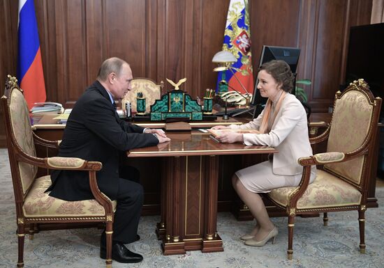 President Vladimir Putin meets with Children's Rights Commissioner Anna Kuznetsova