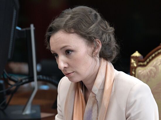 President Vladimir Putin meets with Children's Rights Commissioner Anna Kuznetsova