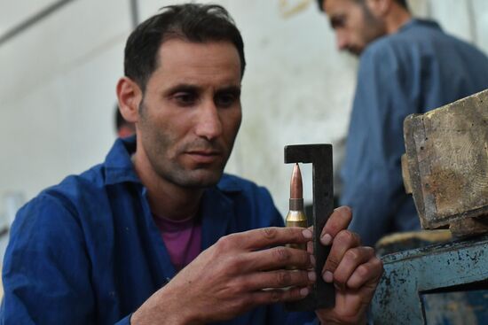 Cartridge manufacturing plant in Hama suburb