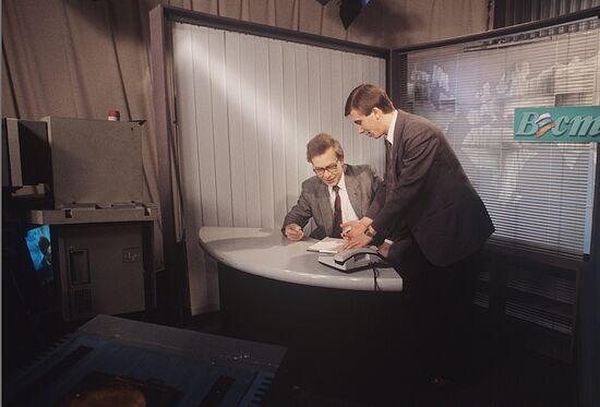 Newscasters Alexander Shashkov also Mikhail Ponomaryov