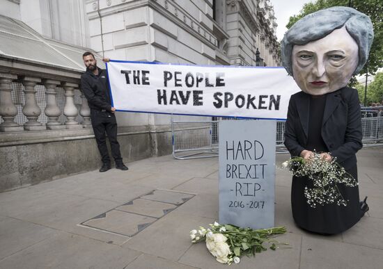 Theresa May claims she has permission to form new government