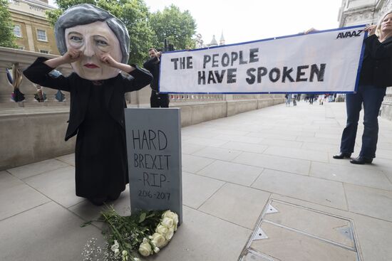 Theresa May claims she has permission to form new government