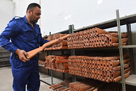 Artillery weapon, mortar and small arms repair works in Hama province