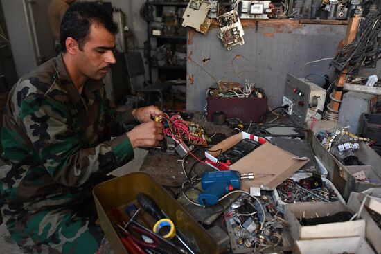Armored vehicle maintenance company in Homs