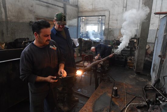 Armored vehicle maintenance company in Homs