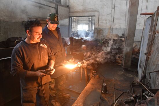 Armored vehicle maintenance company in Homs