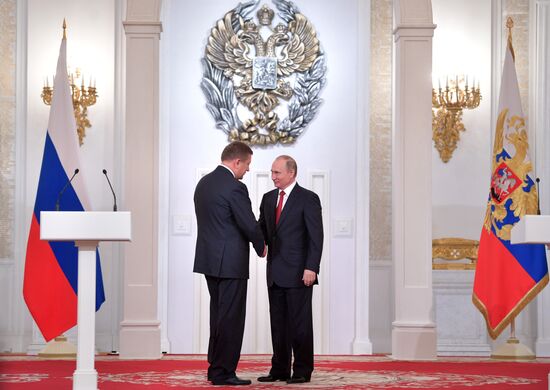 President Vladimir Putin awards state decorations on Russia Day