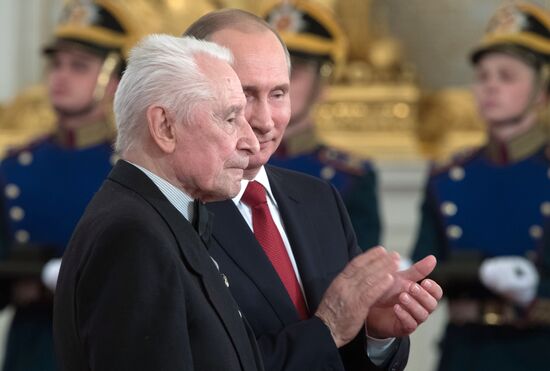 President Vladimir Putin awards state decorations on Russia Day