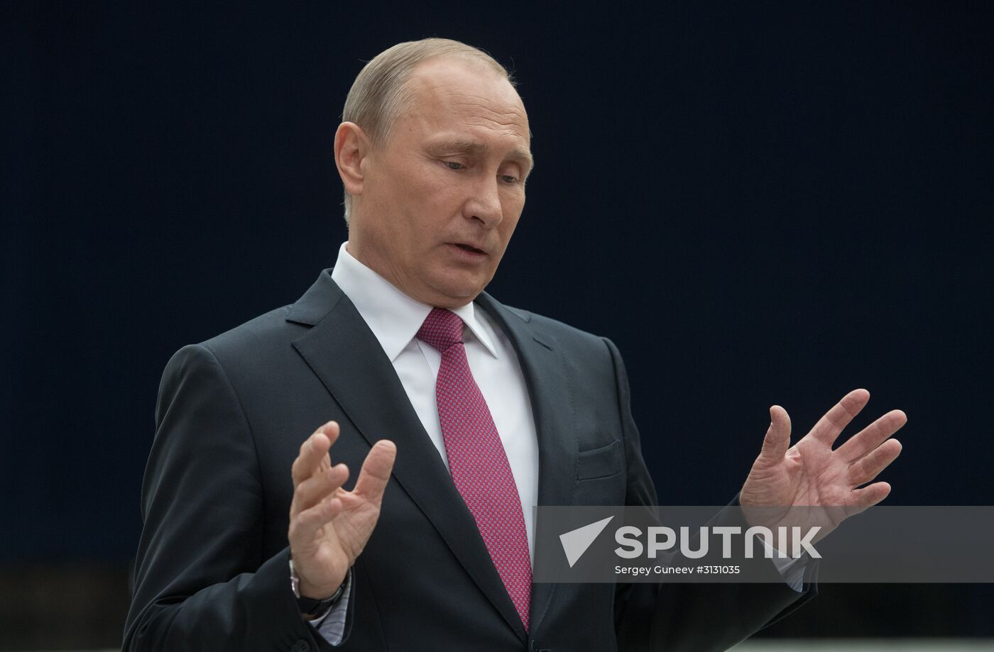 Russian President Vladimir Putin answers journalists' questions
