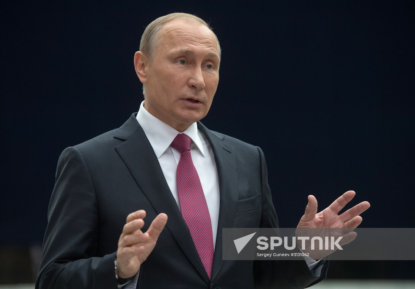 Russian President Vladimir Putin answers journalists' questions