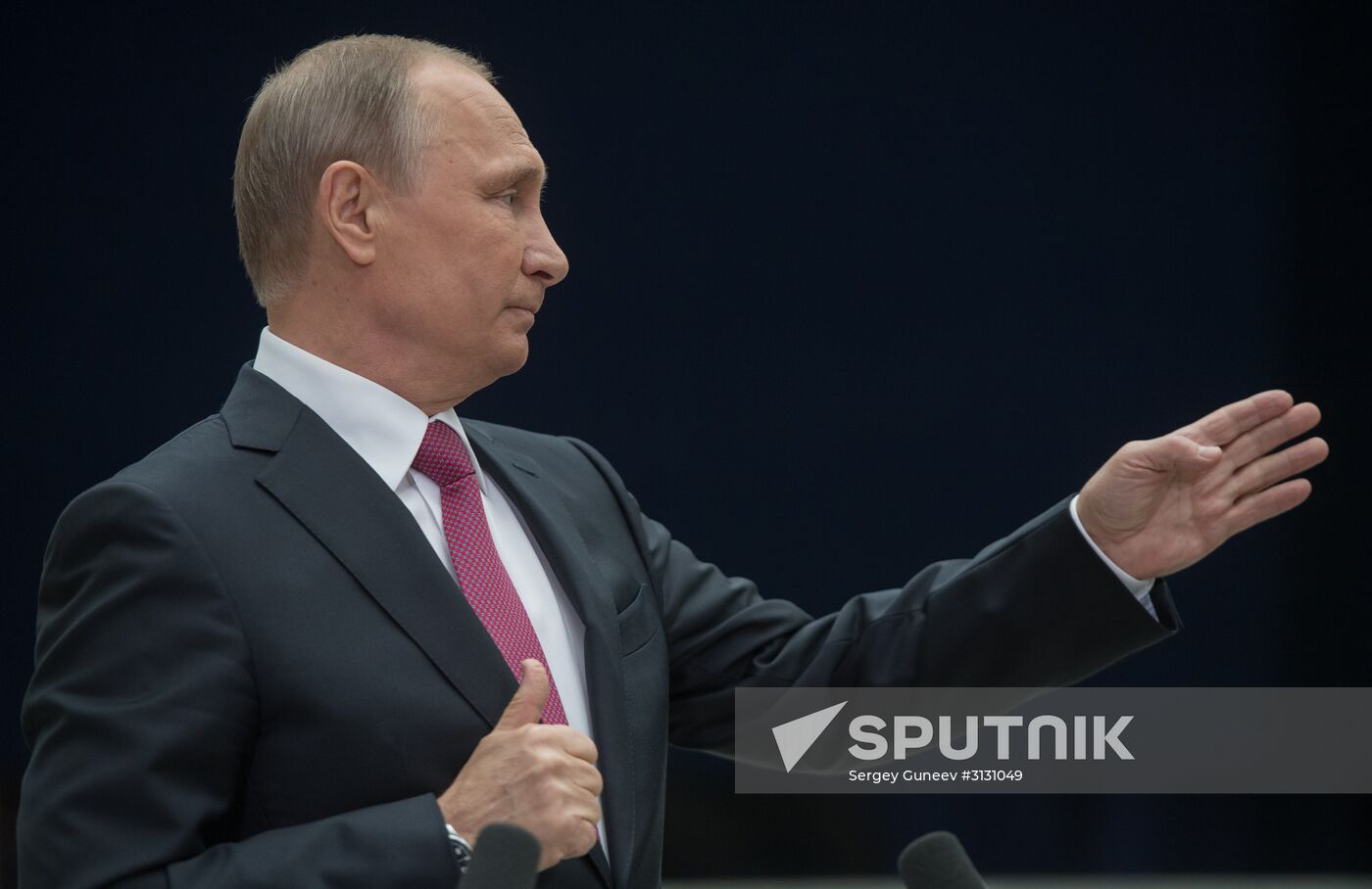Russian President Vladimir Putin answers journalists' questions