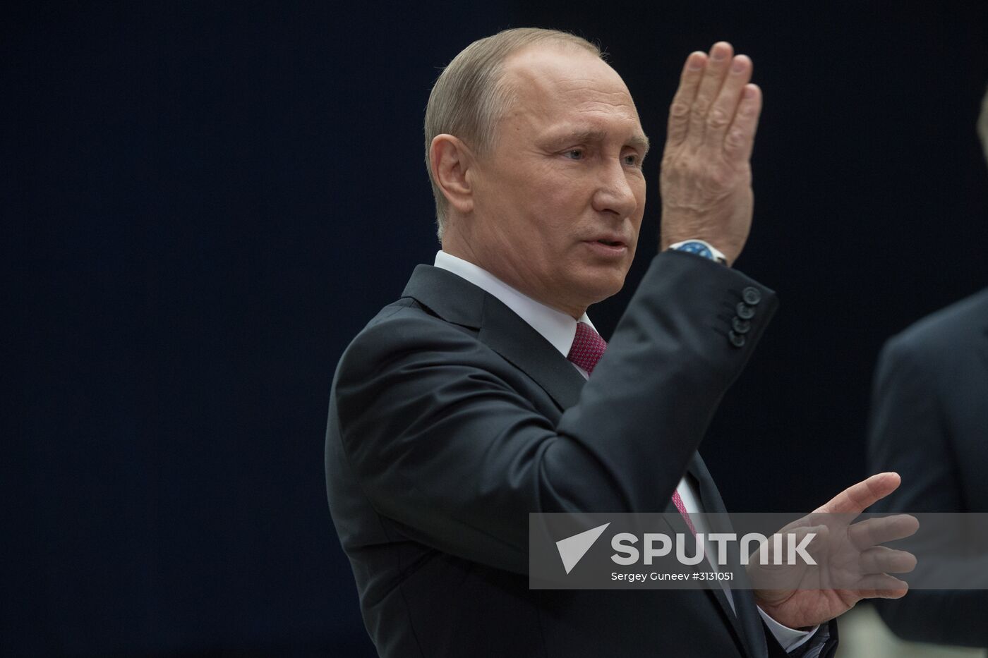 Russian President Vladimir Putin answers journalists' questions