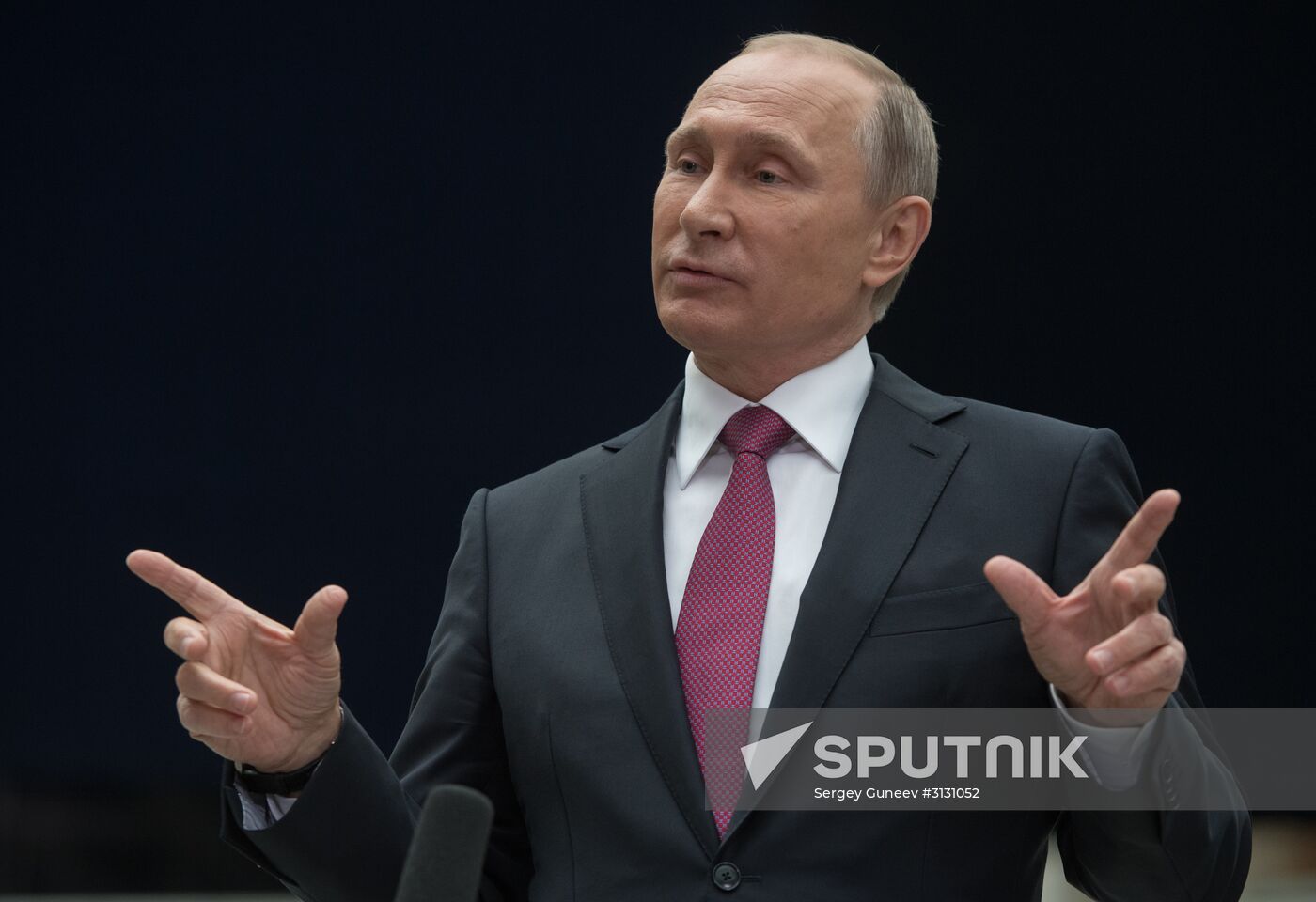 Russian President Vladimir Putin answers journalists' questions