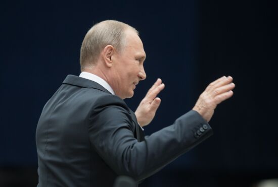 Russian President Vladimir Putin answers journalists' questions