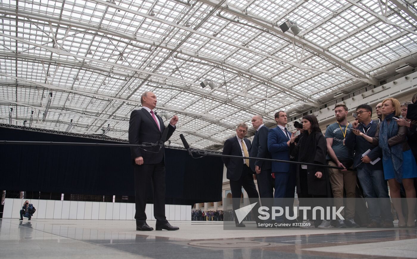 Russian President Vladimir Putin answers journalists' questions
