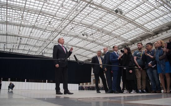 Russian President Vladimir Putin answers journalists' questions