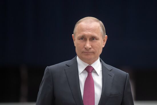 Russian President Vladimir Putin answers journalists' questions