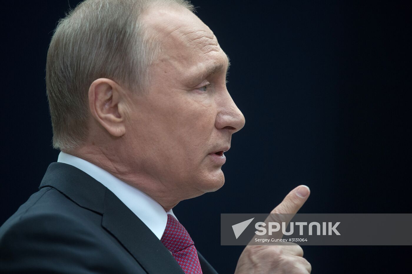 Russian President Vladimir Putin answers journalists' questions
