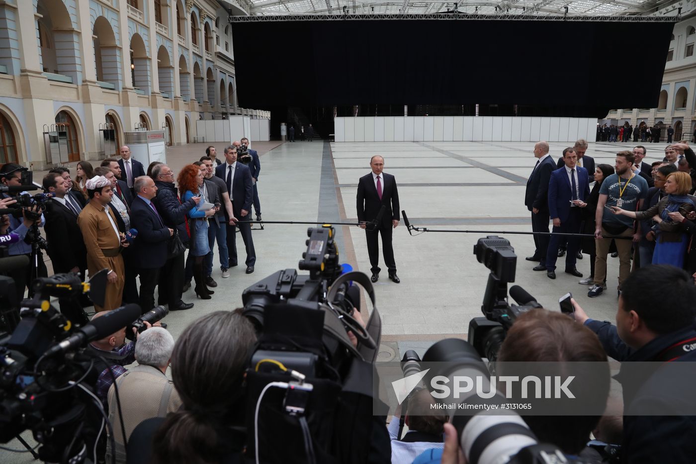 Russian President Vladimir Putin answers journalists' questions