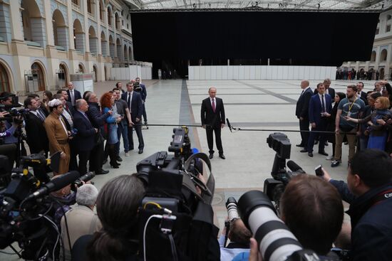 Russian President Vladimir Putin answers journalists' questions