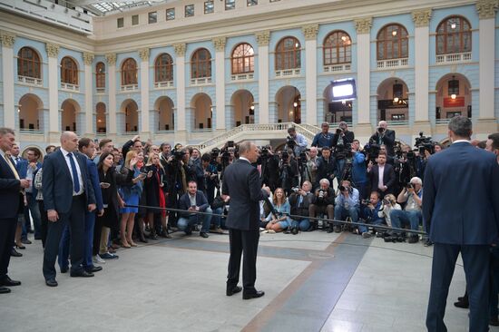 Russian President Vladimir Putin answers journalists' questions