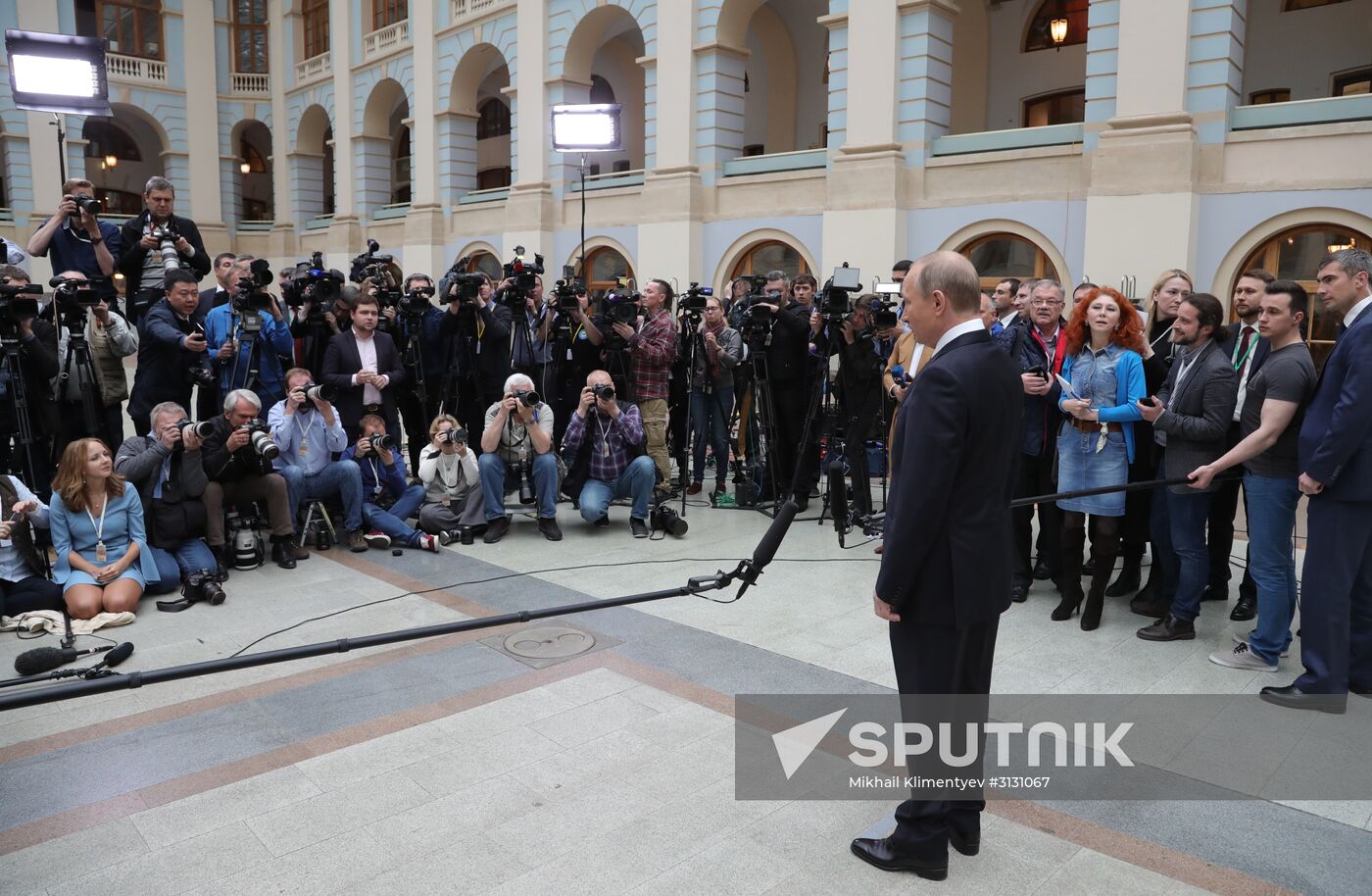 Russian President Vladimir Putin answers journalists' questions